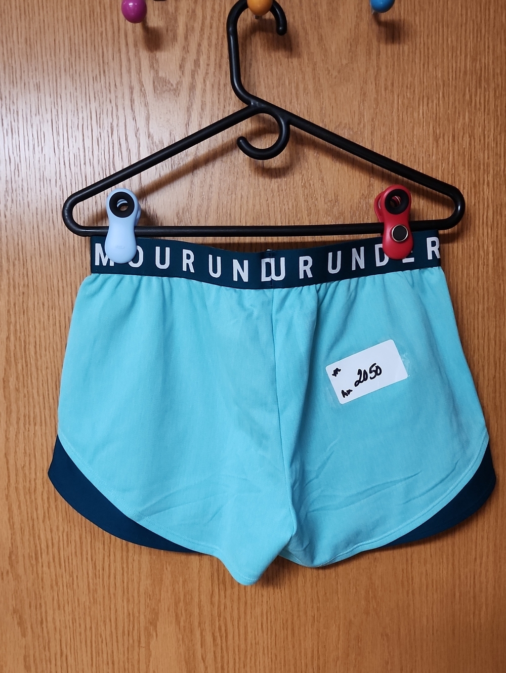 Under Armour Light Blue Athletic Shorts with Navy Trim womens M number 2050